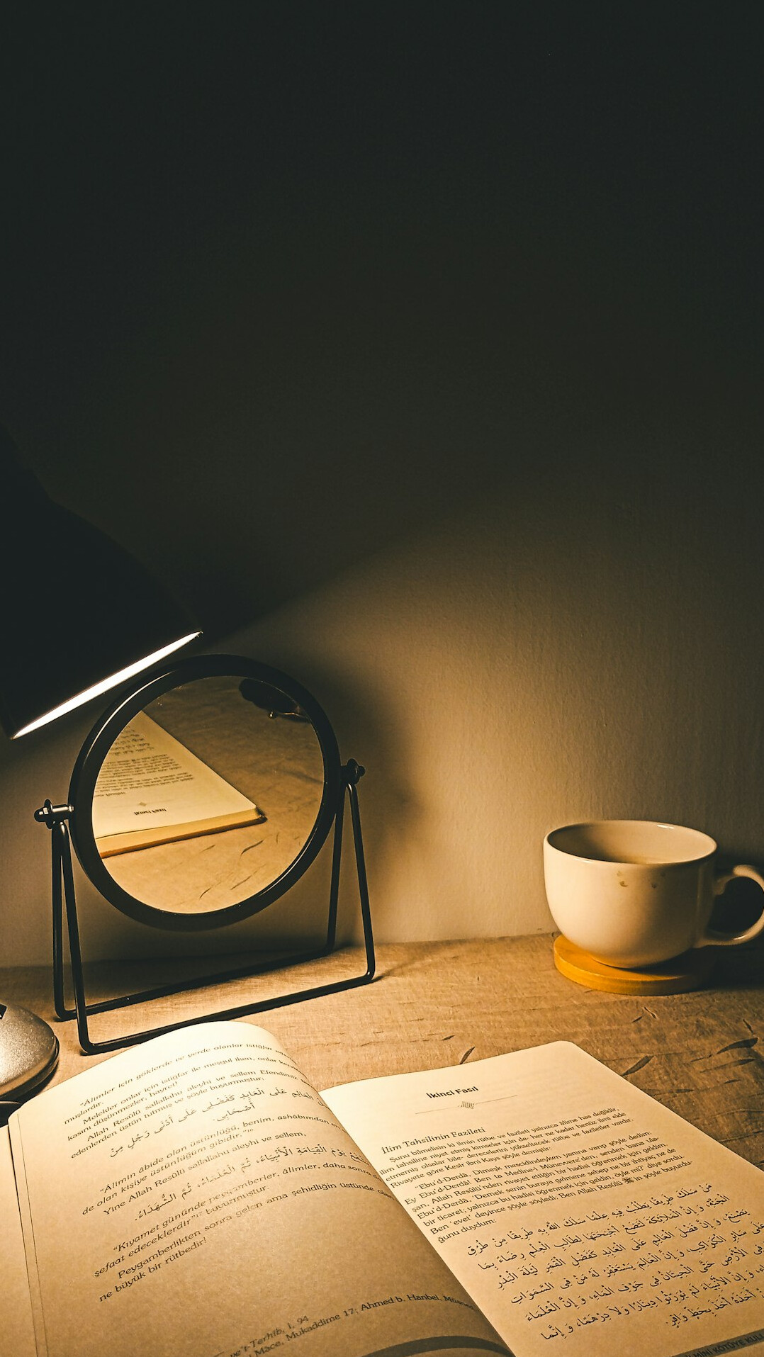 dark writing desk with mystery novel